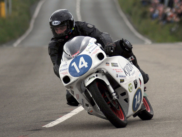 Rob Barber in action during the SES TT Zero race at the 2012 Isle of Man TT fuelled by Monster Energy